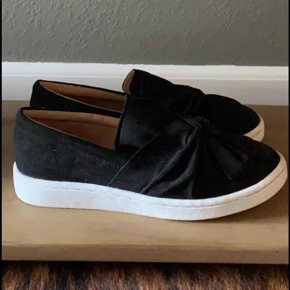 Black slip on sneakers